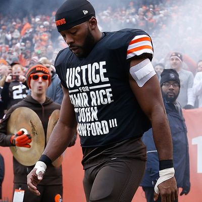 Andrew Hawkins #16 of the Cleveland Browns walks onto the field while wearing a protest shirt during introductions prior to the game against the Cincinnati Bengals at FirstEnergy Stadium on December 14, 2014 in Cleveland, Ohio. 