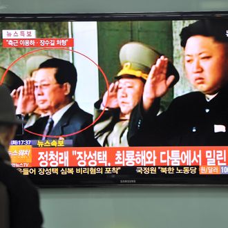 A South Korean man watches TV news about the alleged dismissal of Jang Song-Thaek, North Korean leader Kim Jong-Un's uncle, at a railway station in Seoul on December 3, 2013. South Korea's spy agency suggested in parliament that Jang migh have been removed from his post with two of his close confidants executed in public in late November. 