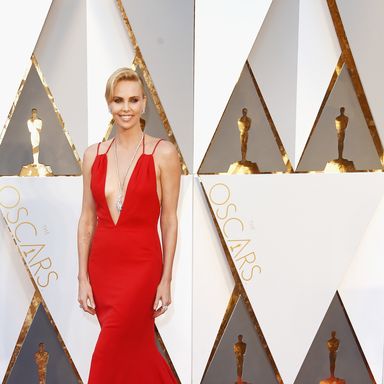 Charlize Theron 
Dress by Dior Haute Couture; jewels by Harry Winston.