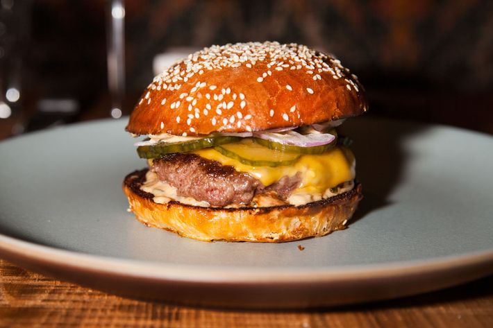 The burger is made from a mix of chuck and wagyu flap meat and served on a housemade bun with American cheese, pickles, and special sauce.