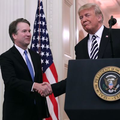 U.S. Supreme Court Justice Brett Kavanaugh (L) shakes hands with President Donald Trump during Kavanaugh's ceremonial swearing in in the East Room of the White House October 08, 2018 in Washington, DC.
