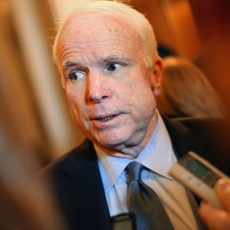 WASHINGTON, DC - JUNE 08: U.S. Sen. John McCain (R-AZ) speaks with reporters at the U.S. Capitol after the Senate voted on a bill regarding fees that merchants pay banks each time a shopper swipes a debit card June 8, 2011 in Washington, DC. The legislation caps debit card swipe fees to 12 cents per transaction. Fees now average 44 cents. (Photo by Win McNamee/Getty Images)