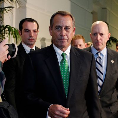 House Speaker John Boehner (R-OH) walks out after a second meeting with House Republicans at the US Capitol on January 1, 2013 in Washington, DC. Lawmakers are under pressure to pass at least some form of fiscal cliff crisis legislation before financial markets open on Wednesday, but it was increasingly unclear whether that could be done. 