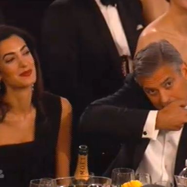 Clooney lifts his mask to reveal he is controlled by a little alien from the planet Charm, where they eat pranks to survive.