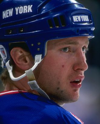 31 Jan 1996: Defenseman Alexander Karpovtsev of the New York Rangers looks on during a game against the Dallas Stars at Reunion Arena in Dallas, Texas. The game was a tie, 1-1. Mandatory Credit: Joe Patronite /Allsport