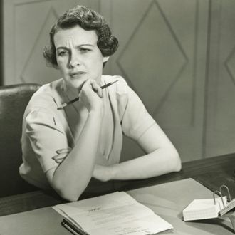 Woman Working At Typewriter by George Marks