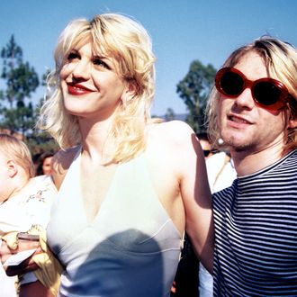 UNITED STATES - SEPTEMBER 02: Kurt Cobain, Courtney Love and baby Frances Bean attending the 1993 MTV Music Video Awards in Los Angeles 09/02/93 (Photo by Vinnie Zuffante/Getty Images)