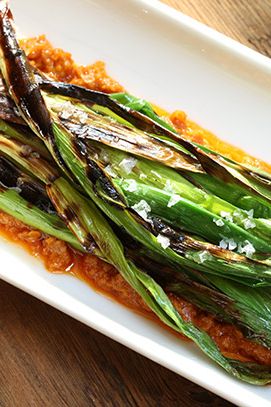 Grilled baby leeks, romesco