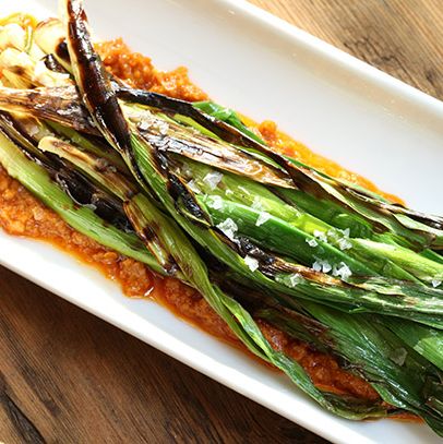 Grilled baby leeks, romesco