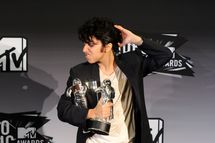 LOS ANGELES, CA - AUGUST 28:  Singer Lady Gaga dressed as "Jo Calderone", winner of Best Female Video Award and Best Video with a Message Award for "Born This Way" poses in the press room during the 2011 MTV Video Music Awards at Nokia Theatre L.A. LIVE on August 28, 2011 in Los Angeles, California.  (Photo by Jason Merritt/Getty Images)