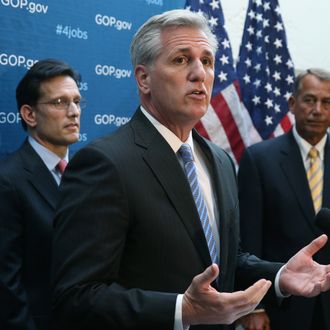 WASHINGTON, DC - JANUARY 08: House Majority Whip Kevin McCarthy (R-CA) speaks to the media while flanked by House Majority Leader Eric Cantor (R-VA) (L) and House Speaker John Boehner (R-OH) (R), after attending the weekly House Republican conference at the U.S. Capitol January 8, 2014 in Washington, DC. Speaker Boehner spoke on various issues including unemployment insurance. (Photo by Mark Wilson/Getty Images)