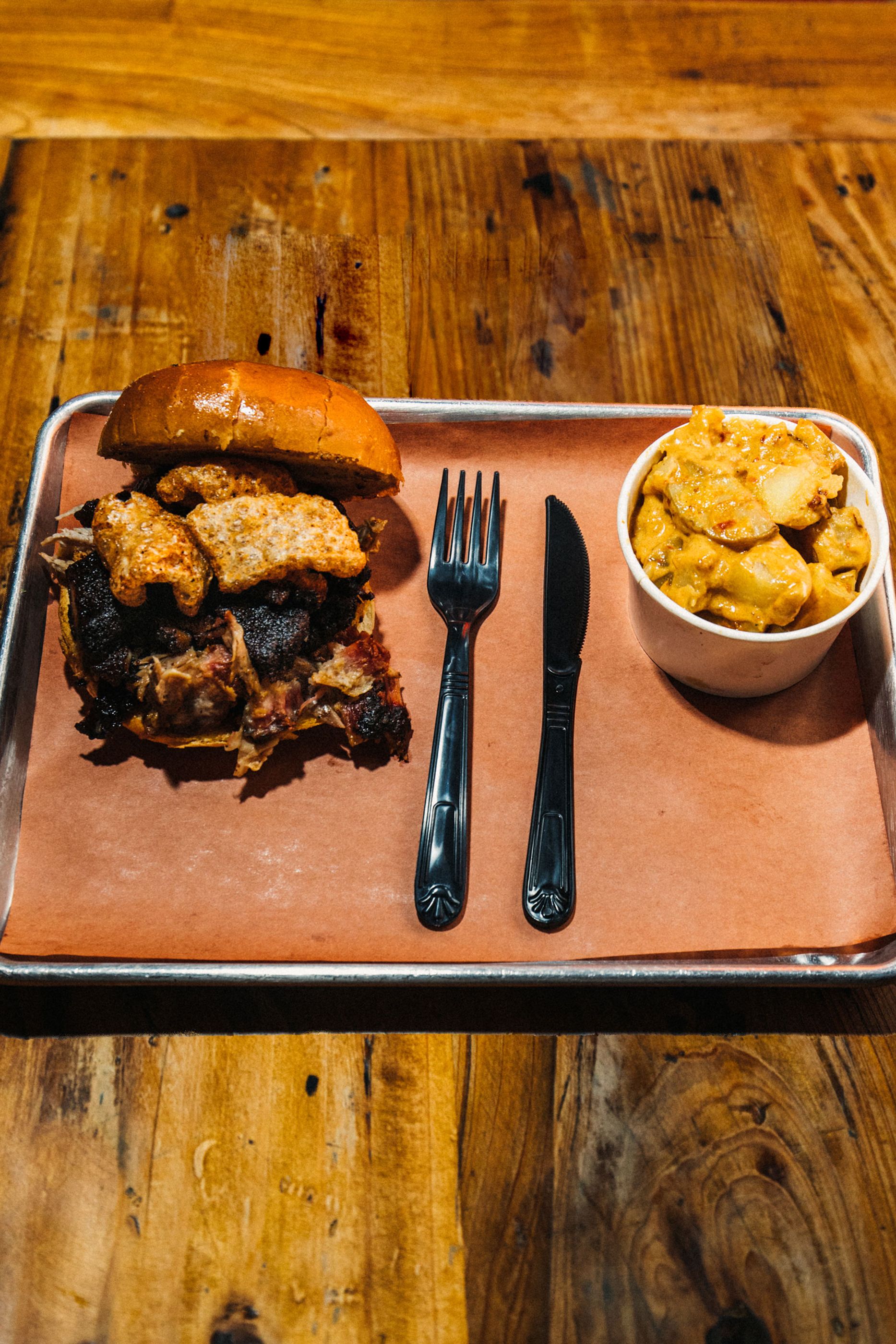 The Hat Trick sandwich, with pork, pork belly, and pork cracklins.