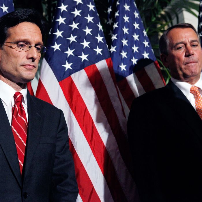 Speaker of the House John Boehner (R-OH) (R) and Majority Leader Eric Cantor (R-VA) hold a brief news conference on December 19, 2011 in Washington, DC.
