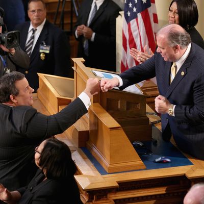 Republican New Jersey Governor Chris Christie (L), greets New Jersey Senate President Steve Sweeney, a Democrat, before Christie's State of the State Address in the Assembly Chamber at the Statehouse on January 8, 2013 in Trenton, New Jersey.