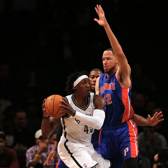 NEW YORK, NY - DECEMBER 14: Gerald Wallace #45 of the Brooklyn Nets tries to get around Tayshaun Prince #22 of the Detroit Pistons on December 14, 2012 at the Barclays Center in the Brooklyn borough of New York City. NOTE TO USER: User expressly acknowledges and agrees that, by downloading and/or using this photograph, user is consenting to the terms and conditions of the Getty Images License Agreement. (Photo by Elsa/Getty Images)