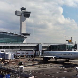 A plane waits at John F. Kennedy Airport on February 28, 2013 in New York City. Should the $85 billion in automatic federal budget cuts, known as the sequester, go into effect Friday as scheduled, airport control towers in a number of states could close, putting pilots and staff members at risk. In addition to the closed control towers, Transportation Security Administration (TSA) workers could be furloughed, leading to long waits and confusion at many airport security checkpoints.