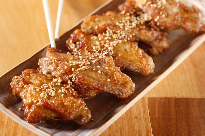 Tebasaki karage: Japanese fried chicken wings with sesame, soy sauce, and white pepper.