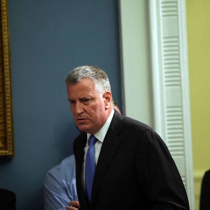 NEW YORK, NY - JULY 18: New York Mayor Bill de Blasio enters a news conference to address the recent death of a man in police custody on July 18, 2014 in New York City. The mayor has promised a full investigation into the circumstances surrounding the death of Eric Garner after he was taken into police custody in Staten Island yesterday. A 400-pound, 6-foot-4 asthmatic, Garner (43) died after police put him in a chokehold outside of a conveinence store for illegally selling cigarettes. (Photo by Spencer Platt/Getty Images)
