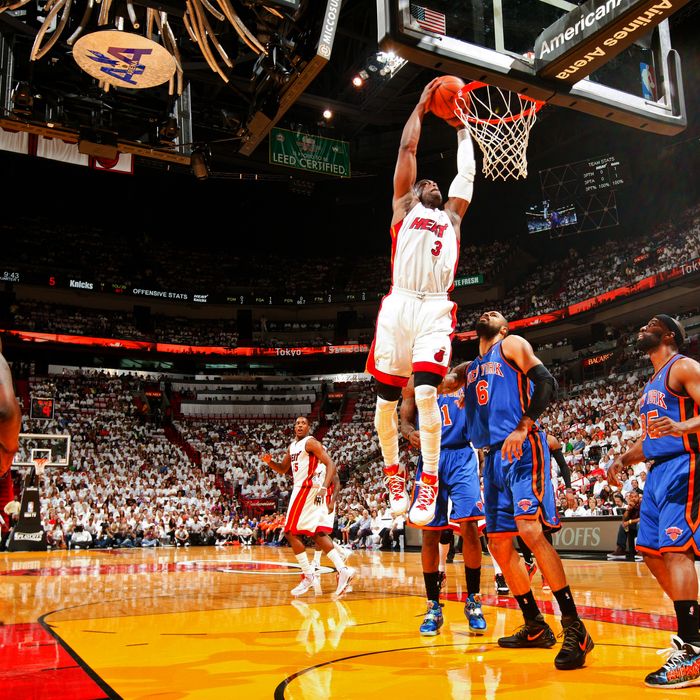 Dwyane Wade #3 of the Miami Heat dunks against Tyson Chandler #6 of the New York Knicks in Game One of the Eastern Conference Quarterfinals during the 2012 NBA Playoffs on April 28, 2012 at American Airlines Arena in Miami, Florida. 