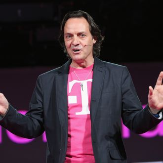 NEW YORK, NY - MARCH 26: John Legere, CEO and President of T-Mobile USA, makes an announcement during an event about new contract pricing on March 26, 2013 in New York City. Legere confirmed that T-Mobile will start carrying the iPhone 5 starting April 12, under it's new no-contract plan called The Simple Choice, with the customers paying $99 down, then $20 a month for 24 months, on top of the monthly service plan. (Photo by John Moore/Getty Images)