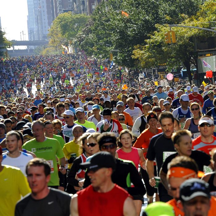 Runners make their way through Queens during the 2011 ING New York City Marathon in New York November 6, 2011. The 26.2 mile marathon course is through the five bouroughs of New York City and is one of the largest in the world. AFP PHOTO TIMOTHY A. CLARY (Photo credit should read TIMOTHY A. CLARY/AFP/Getty Images)