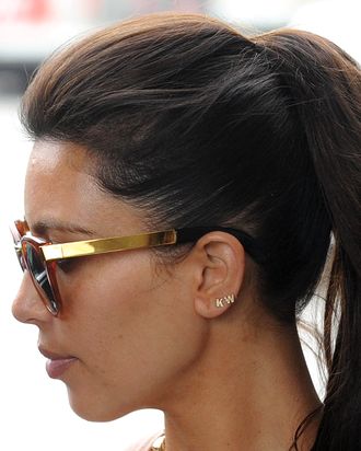 Kim's 'KW' earrings.