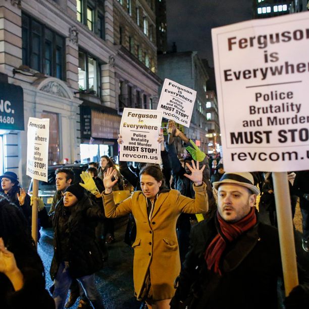 NEW YORK, NY - DECEMBER 3: People take part in a protest in Manhattan after a grand jury decided not to indict New York Police Officer Daniel Pantaleo in Eric Garner's death on December 3, 2014 in New York City. Eric Garner was killed by a police officer Daniel Pantaleo on July 17, 2014 after Pantaleo suspected him of selling untaxed cigarettes and putting him in a choke hold. (Photo by Kena Betancur/Getty Images)