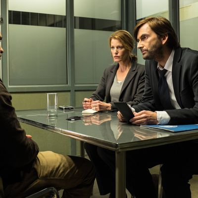 GRACEPOINT: Mark Solano (Michael Pe?a, L) is questioned by Detectives Emmett Carver (David Tennant, R) and Ellie Miller (Anna Gunn, C) in 