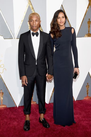 Pharrell Williams and Helen Lasichanh 
Suit by Lanvin.