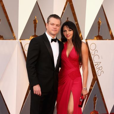 Matt Damon and Luciana Damon 
Suit by Versace; dress by Atelier Versace.