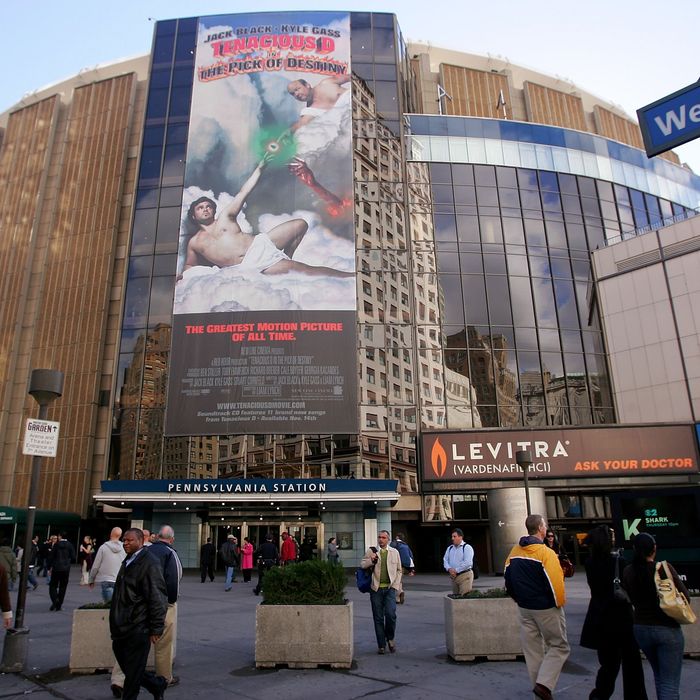 NEW YORK - NOVEMBER 09: People walk past Madison Square Garden November 9, 2006 in New York City. (Photo by Chris McGrath/Getty Images)