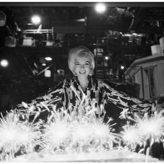 American actress Marilyn Monroe (1926 - 1962) celebrates her birthday with cake and sparklers during the filming of 'Something's Got to Give' (directed by George Cukor), Los Angeles, California, June 1, 1962. This was Monroe's last day on the set before she was fired. (Photo by Lawrence Schiller/Polaris Communications/Getty Images)