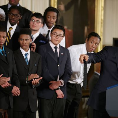 WASHINGTON, DC - FEBRUARY 27: U.S. President Barack Obama (R) delivers remarks about his 'My Brother's Keeper' initiative with students from the Hyde Park Academy in the East Room at the White House February 27, 2014 in Washington, DC. As part of his 'Year of Action,' Obama announced a $200 million commitment from nine foundations to bolster the education and employment of young men and boys of color. (Photo by Chip Somodevilla/Getty Images)