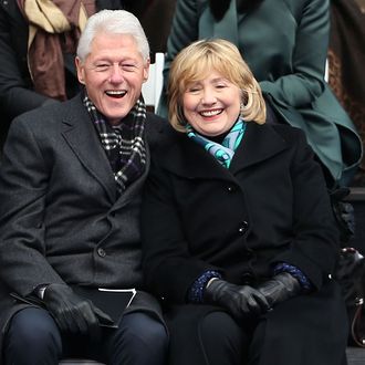 Hillary and Bill Clinton (right) sit with New York Governor Andrew Cuomo and his girlfriend Sandra Lee (left) as they watch ceremonies for New York City's 109th Mayor Bill de Blasio on January 1, 2014 in New York City. Mayor de Blasio was sworn in using a Bible once owned by President Franklin Delano Roosevelt. Following the 12 years of the Michael Bloomberg administration, Mayor de Blasio won on a liberal platform that emphasized the growing gulf between the rich and poor in New York City. 