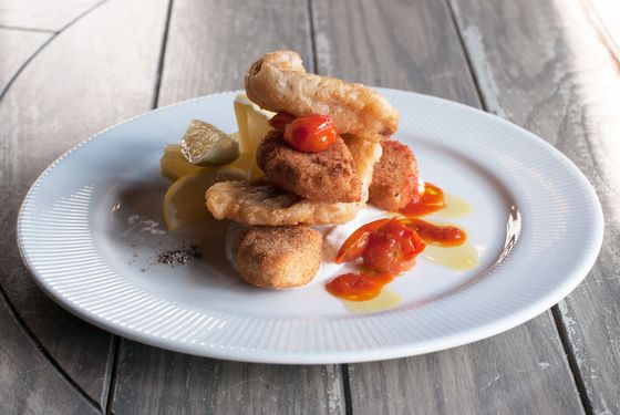 Crispy cod and ricotta with tomato and skordalia.