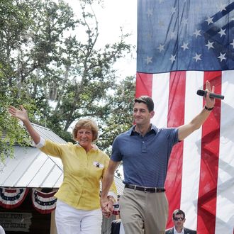THE VILLAGES, FL - AUGUST 18: Republican Vice Presidential candidate, U.S. Rep. Paul Ryan (R-WI) (R) and his mother Elizabeth Ryan wave during the Victory Rally in Florida at Town Square, Lake Sumter Landing on August 18, 2012 in The Villages, Florida. Ryan spoke about his family's reliance on Medicare. (Photo by Gerardo Mora/Getty Images)