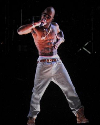 INDIO, CA - APRIL 15: A holographic image of Tupac Shakur is seen performing during day 3 of the 2012 Coachella Valley Music & Arts Festival at the Empire Polo Field on April 15, 2012 in Indio, California. (Photo by Kevin Winter/Getty Images for Coachella)