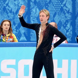 Evgeny Plyushchenko of Russia waves to fans after withdrawing from the competition after warming up during the Men's Figure Skating Short Program on day 6 of the Sochi 2014 Winter Olympics at the at Iceberg Skating Palace on February 13, 2014 in Sochi, Russia.