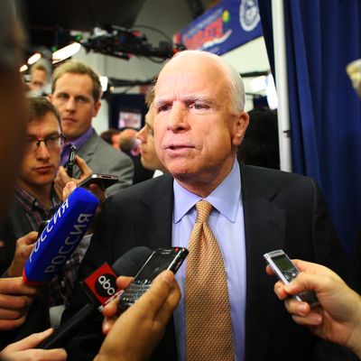 U.S. Sen. John McCain (R-AZ) speaks to the media prior to the debate between U.S. President Barack Obama and Republican presidential candidate Mitt Romney at the Keith C. and Elaine Johnson Wold Performing Arts Center at Lynn University on October 22, 2012 in Boca Raton, Florida. The focus for the final presidential debate before Election Day on November 6 is foreign policy. 