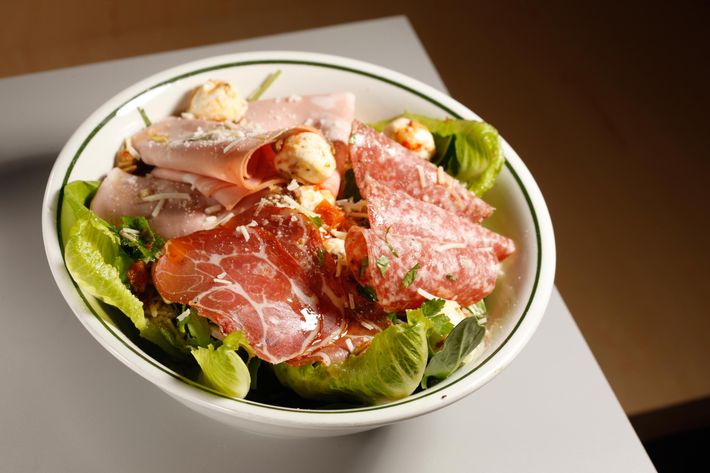 A hero in salad form, the Italian Chef salad is made with mortadella, copa, salami, mozzarella marinated in their Hoagie Spread, red onions, and red-wine vinaigrette.