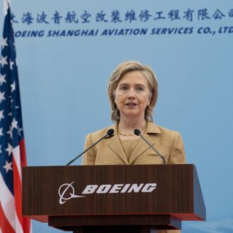 US Secretary of State Hillary Clinton speaks on commercial development at the Boeing Maintenance Facility at Pudong International Airport in Shanghai, May 23, 2010. AFP PHOTO / POOL / Saul LOEB (Photo credit should read SAUL LOEB/AFP/Getty Images)