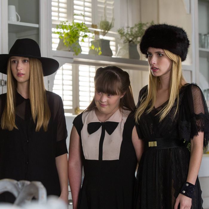 AMERICAN HORROR STORY: COVEN Head - Episode 309 (Airs Wednesday, December 11, 10:00 PM e/p) --Pictured: (L-R) Taissa Farmiga as Zoe, Jamie Brewer as Nan, Emma Roberts as Madison -- CR. Michele K. Short/FX
