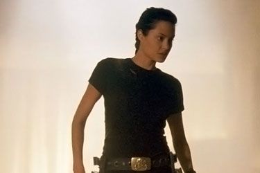Lara Croft — so sexy, so unafraid of zombies. Her skin-tight T-shirt, belt, hot pants, and garter-style gun holsters are hot yet functional, revealing yet not gratuitous. Plus, she actually tied her hair back.