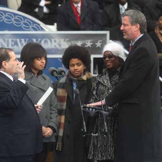 NEW YORK - JANUARY 1: New York City Public Advocate Bill de Blasio takes the oath of office administered by US Congressman Jerrold Nadler (L) acoompanied by his daughter Chiara (2nd-L), son Dante (C) and wife Chirlane (2nd-R) January 1, 2010 at City Hall in New York City. Michael Bloomberg was also inaugurated as Mayor again today. (Photo by Hiroko Masuike/Getty Images) *** Local Caption *** Jerrold Nadle;Bill de Blasio