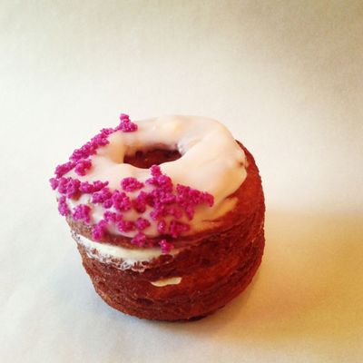 Beneath this rose glaze lies some pretty genius pastry engineering.