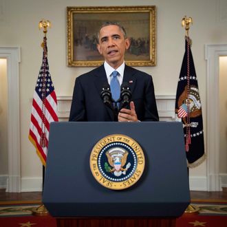 U.S. President Barack Obama speaks during an announcement in Washington, D.C., U.S., on Wednesday, Dec. 17, 2014. Obama will end the U.S. isolation of Cuba that has persisted for more than a half century, initiating talks to resume diplomatic relations, opening a U.S. embassy in Havana and loosening trade and travel restrictions on the nation. Photographer: Doug Mills/Pool via Bloomberg