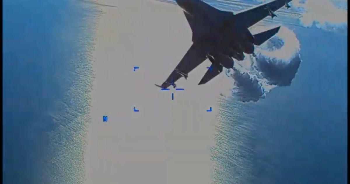 Video Shows Russian Fighter Jets Harassing Downed U.S. Drone