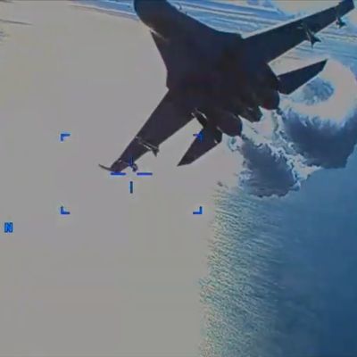 Video Shows Russian Fighter Jets Harassing Downed U.S. Drone