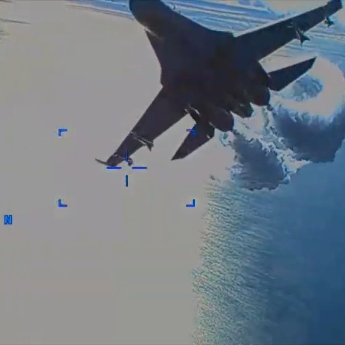 Video Shows Russian Fighter Jets Harassing Downed U.S. Drone