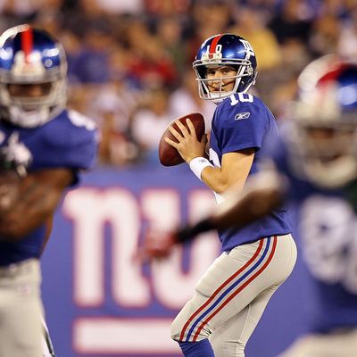 EAST RUTHERFORD, NJ - AUGUST 29: Eli Manning #10 of the New York Giants in action against the New York Jets during their pre season game on August 29, 2011 at MetLife Stadium in East Rutherford, New Jersey. (Photo by Jim McIsaac/Getty Images)